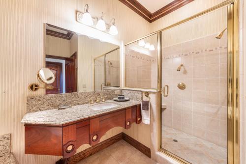 a bathroom with a sink and a shower at Stock Farm Inn in Hopland