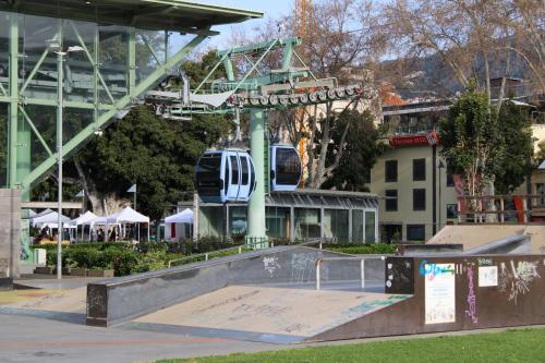 a skate park with a skateboard ramp and a roller coaster at Alexia Room in Funchal