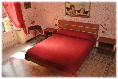 Cama o camas de una habitación en Bed and Breakfast D'Angelo