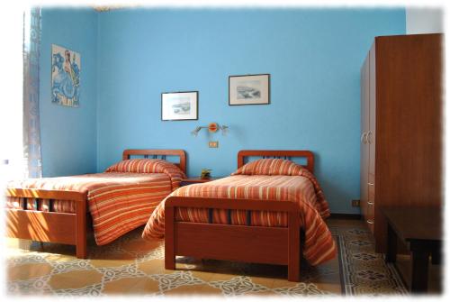 Katil atau katil-katil dalam bilik di Bed and Breakfast D'Angelo
