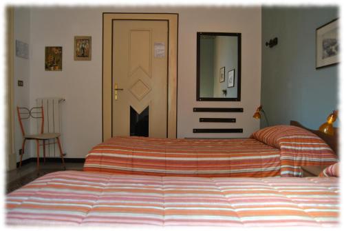 Cama o camas de una habitación en Bed and Breakfast D'Angelo