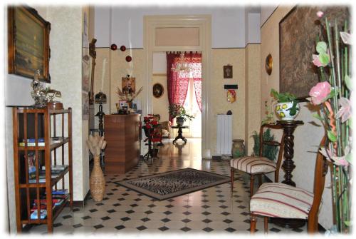 a living room filled with furniture and decor at Bed and Breakfast D'Angelo in Palermo