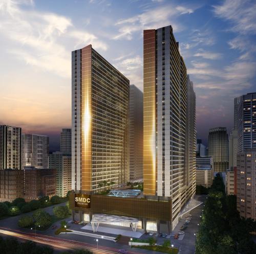 uma representação de dois edifícios altos numa cidade em Cozy 1 BR Condo in Fame Residences Mandaluyong City em Manila
