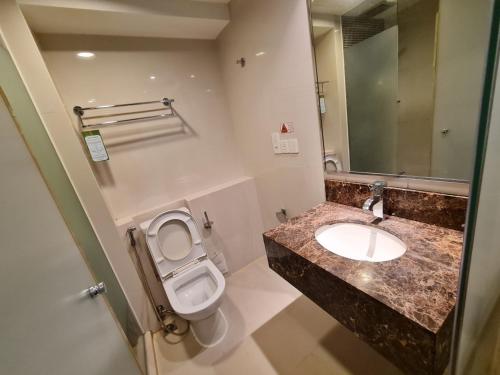 Ένα μπάνιο στο SUN GARDEN Studio and Residences at South China Sea Place Suites