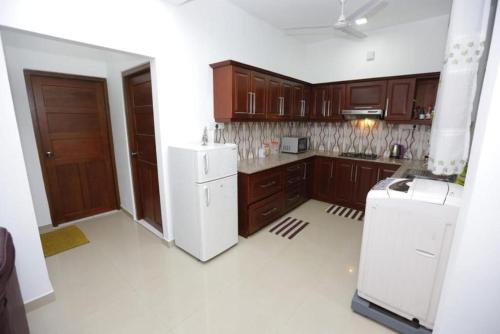 Kuchyň nebo kuchyňský kout v ubytování RACHEL HOMES