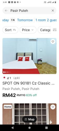 a screenshot of a room with a bed in a room at CZ HOTEL in Pasir Puteh