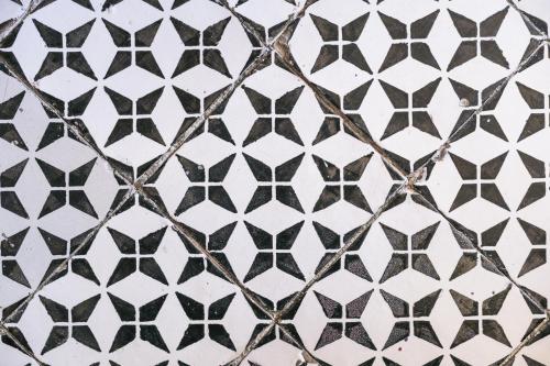 a close up of a tile pattern on a wall at Hotel Toro in Ravello