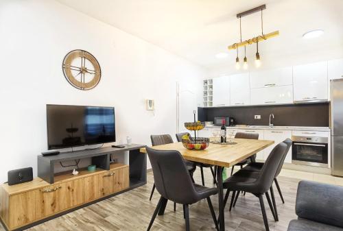 Kuchyň nebo kuchyňský kout v ubytování Apartments Nova