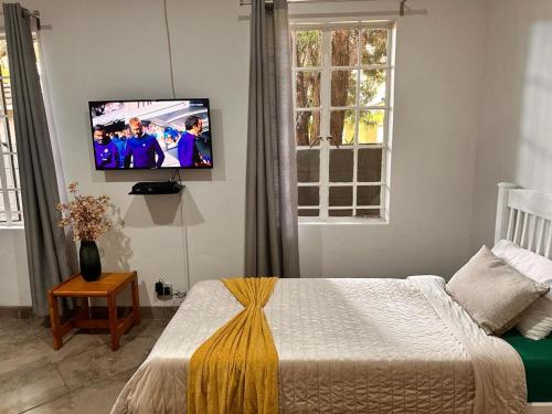 Katil atau katil-katil dalam bilik di WOODS GUEST HOUSE