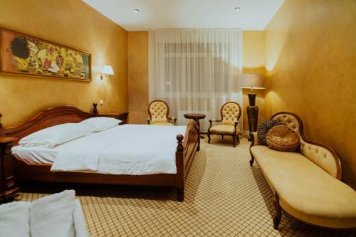 Кровать или кровати в номере Piena muiža - Berghof Hotel & SPA