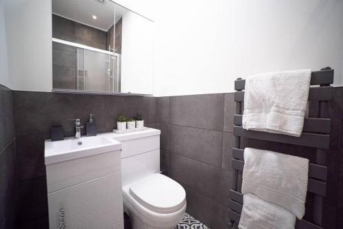 Vannituba majutusasutuses Train Station Apartments