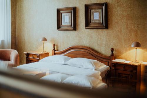 Кровать или кровати в номере Piena muiža - Berghof Hotel & SPA