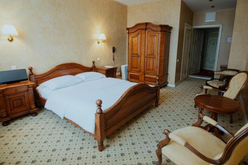 Кровать или кровати в номере Piena muiža - Berghof Hotel & SPA