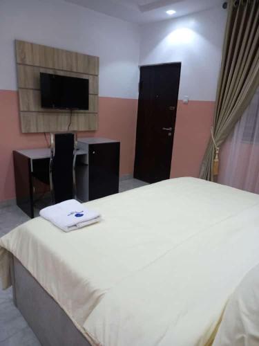 Cama o camas de una habitación en Ecco Ville Hotel