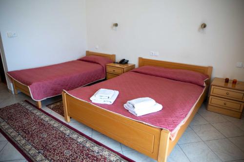 Ένα ή περισσότερα κρεβάτια σε δωμάτιο στο Hotel Kastro