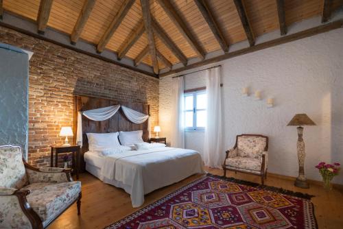 Postel nebo postele na pokoji v ubytování Moy Hotel
