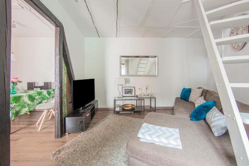 Μια τηλεόραση ή/και κέντρο ψυχαγωγίας στο Mediterrane Maisonette-traumhaftes Feriendomizil
