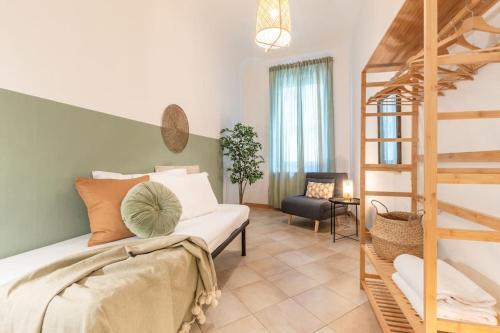 Postel nebo postele na pokoji v ubytování Craft-nel cuore di Siena