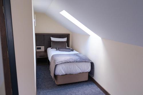 Postel nebo postele na pokoji v ubytování Hotel Münden