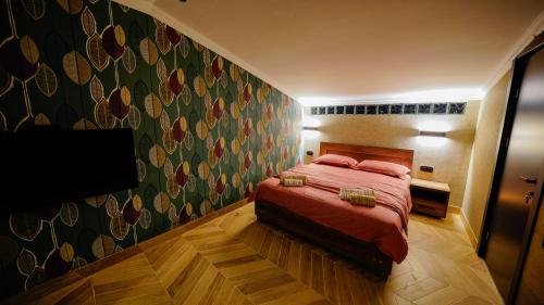 Ένα ή περισσότερα κρεβάτια σε δωμάτιο στο Anbani Apartments - City Center