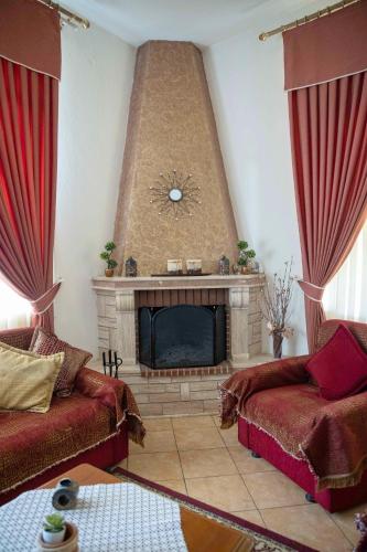 Χώρος καθιστικού στο Hotel Kastro