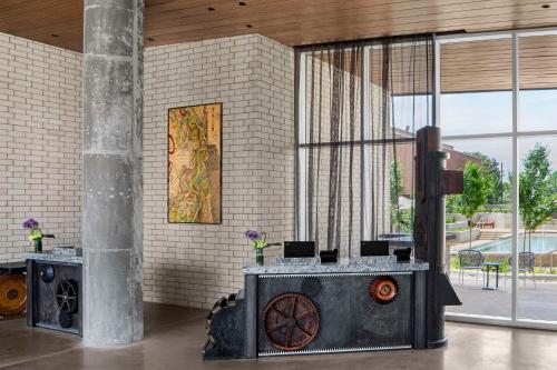 a room with a table with a wheel on it at Hyatt Centric Beale Street Memphis in Memphis