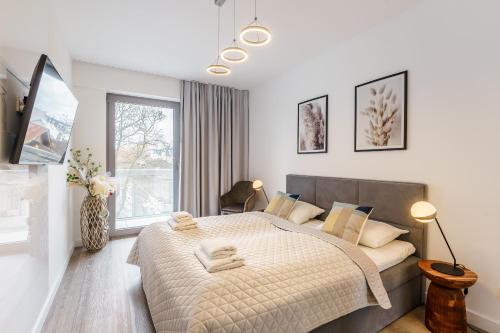 Posteľ alebo postele v izbe v ubytovaní Balticus 16A by Noclegi Renters