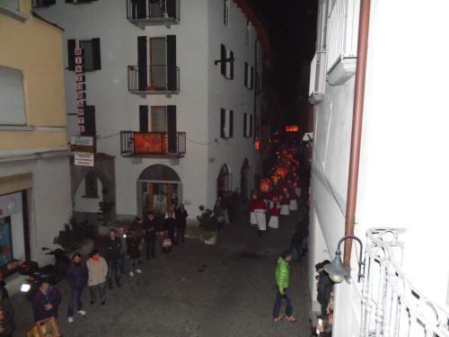 a group of people standing outside of a building at Garni Bar Sport in Mendrisio