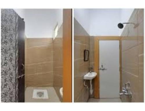 y baño con ducha, aseo y lavamanos. en Siddhi Vinayak Hotel & Marriage Garden, Chandukhedi, en Ujjain