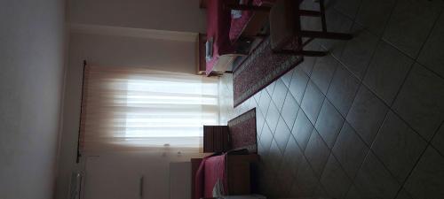 Ένα ή περισσότερα κρεβάτια σε δωμάτιο στο Hotel Kastro