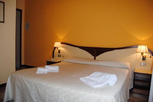 Hotel La Feniceにあるベッド