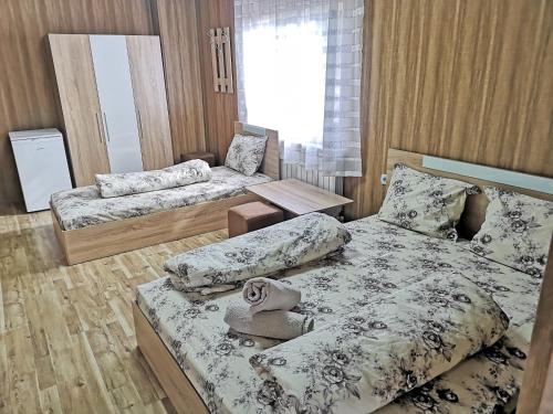Un pat sau paturi într-o cameră la Bali Petrich