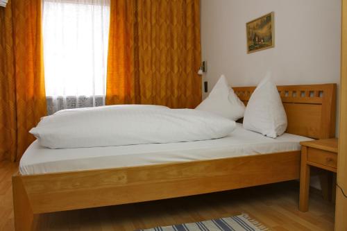 En eller flere senge i et værelse på Gasthof Ölberg