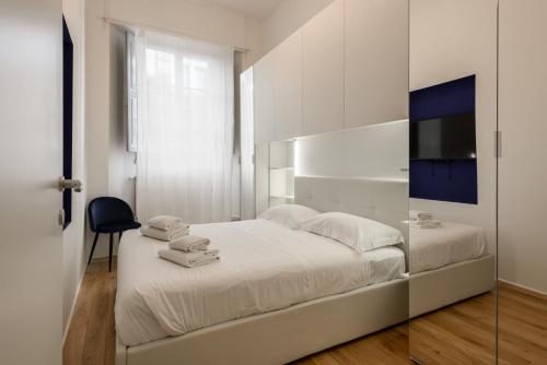 Postel nebo postele na pokoji v ubytování San Niccolò Dream by Mmega