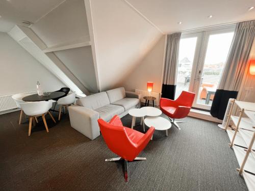 Uma área de estar em Hello Zeeland - Appartement Markt 5 en 5A