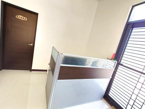 Una cama o camas en una habitación de 別野城北