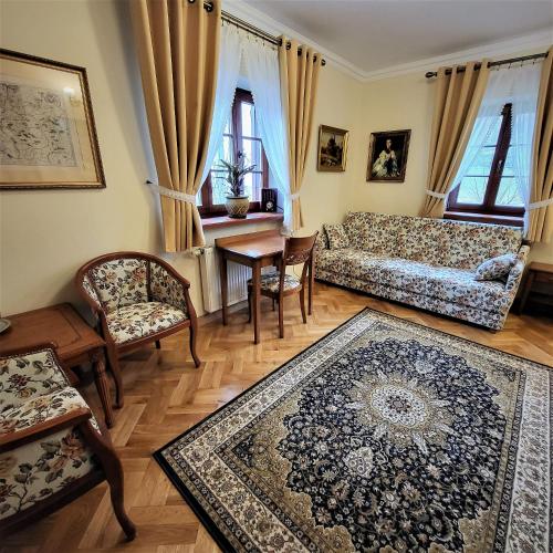 Ένα ή περισσότερα κρεβάτια σε δωμάτιο στο Hotel Sarmata Zespół Dworski