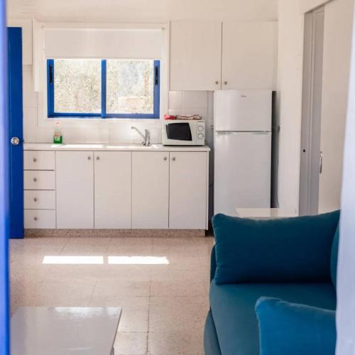 Η κουζίνα ή μικρή κουζίνα στο Flokkas Hotel Apartments