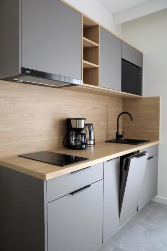 Η κουζίνα ή μικρή κουζίνα στο PATIO APARTAMENTY