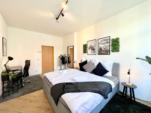 En eller flere senge i et værelse på Großes Apartment Bremerhaven