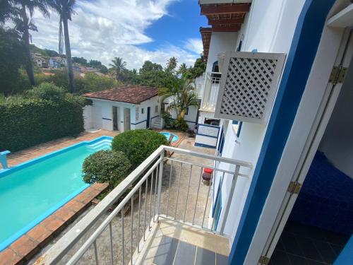 a view from the balcony of a house with a swimming pool at BUONA SORTE in Lençóis