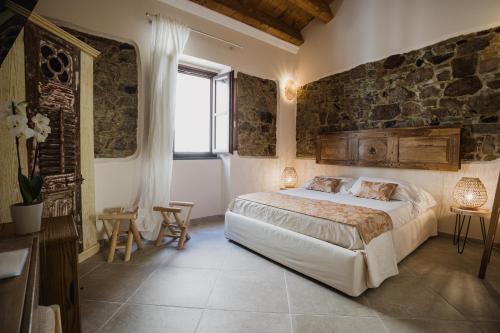 Posteľ alebo postele v izbe v ubytovaní Moon's Tower suite&rooms