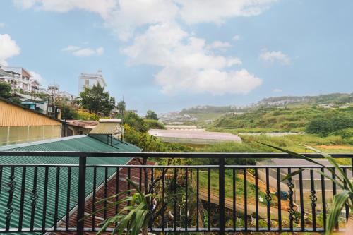 a view of a river from a balcony at GREENECO DA LAT HOTEL - Khách sạn Green Eco Đà Lạt in Da Lat