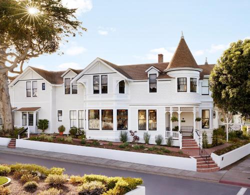 a rendering of a white house at Gosby House Inn, A Four Sisters Inn in Pacific Grove