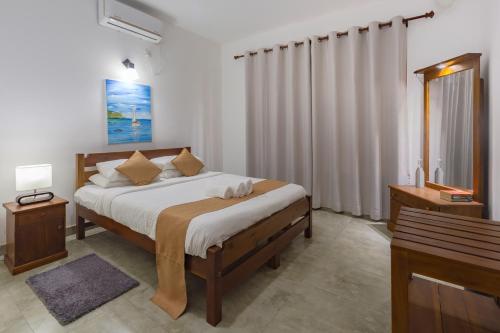 Postel nebo postele na pokoji v ubytování Villa Mount Melody