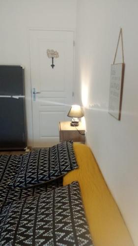 Postel nebo postele na pokoji v ubytování Le Relais de Poste