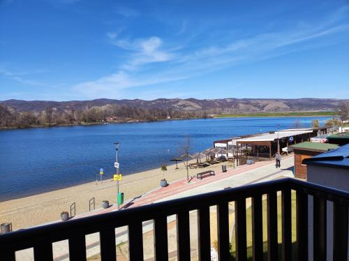 a view of a body of water from a balcony at Adonis in Ostrovo