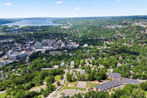 an aerial view of a city and a lake at Walk to Ithaca Commons Bars Shops Trails and Close to Cornell in Ithaca