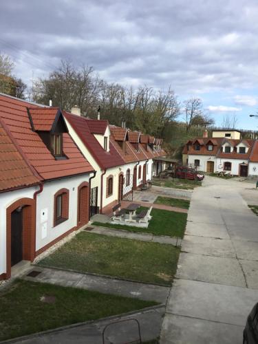 a row of houses with red roofs at Sklep u Dušana in Vracov