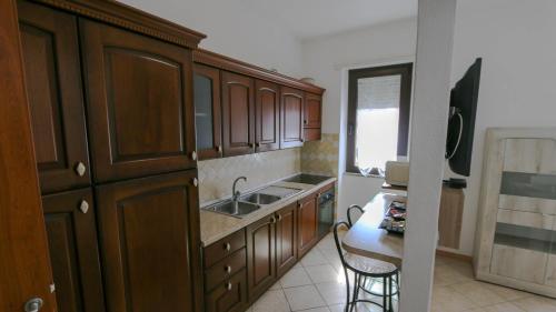 Η κουζίνα ή μικρή κουζίνα στο Casa Vacanze Sas Tancas